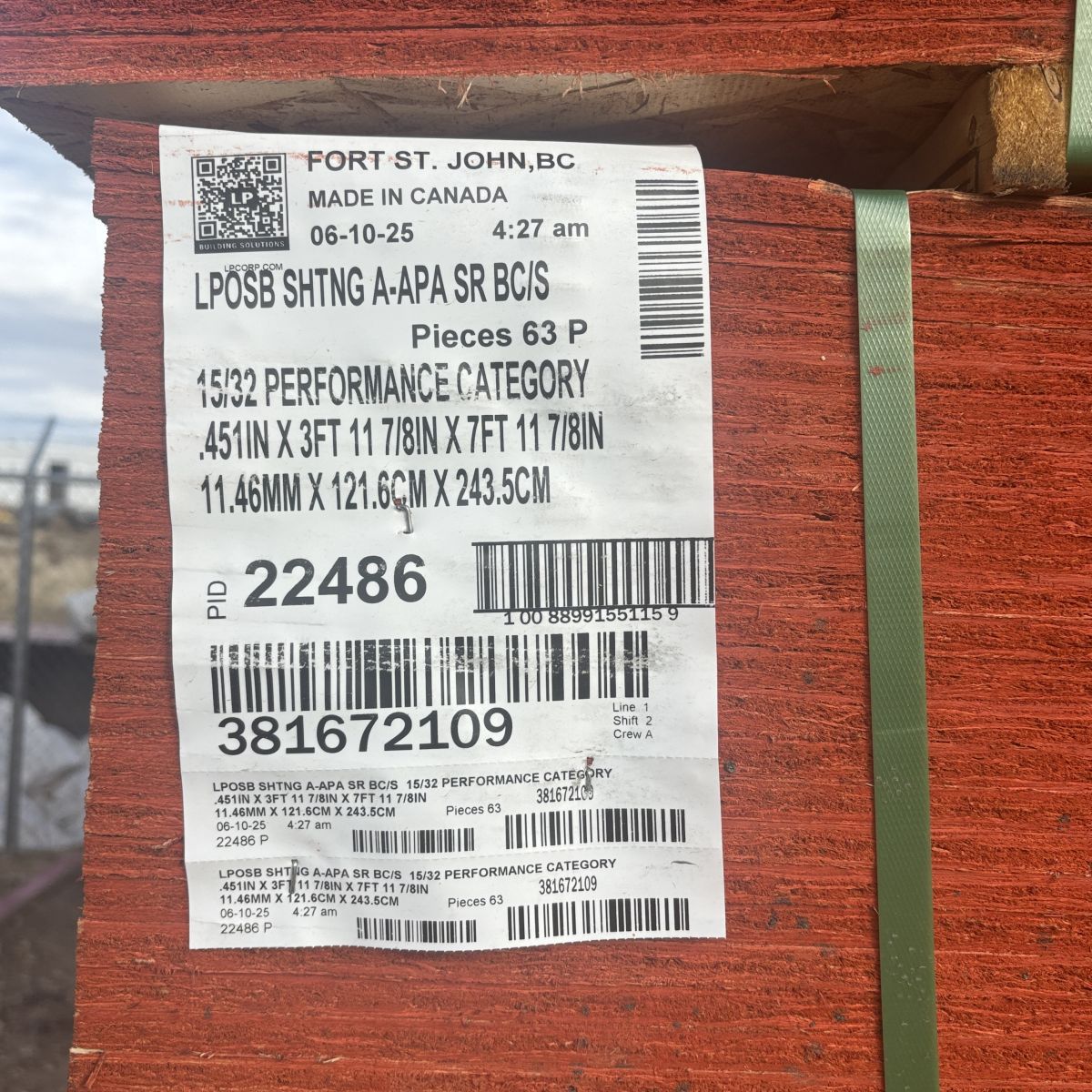 LP branded 15/32 inch 4x8 OSB sheathing with manufacturer label visible