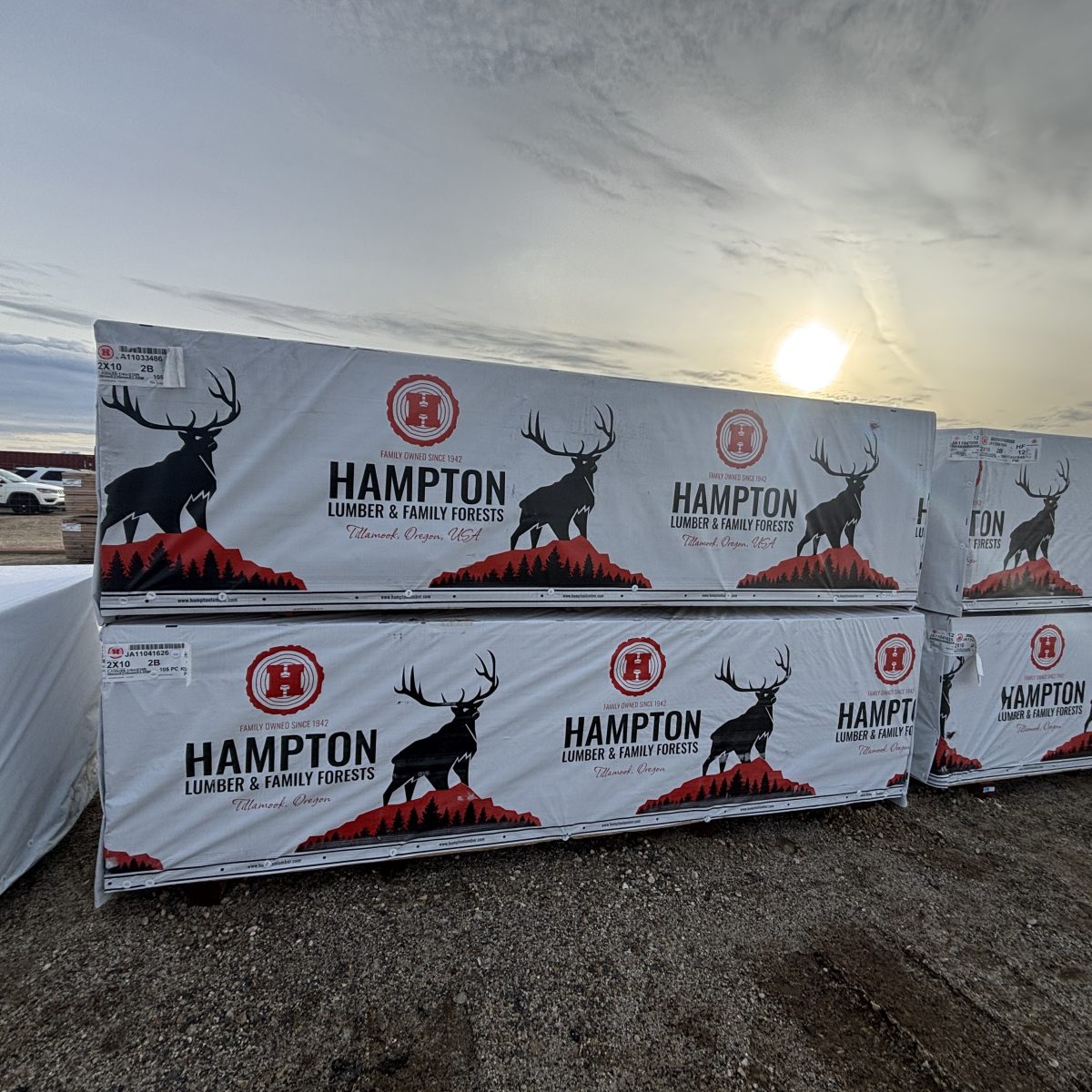 Two stacked units of 2x10x10 foot number 2 grade kiln-dried Hem-Fir lumber stored at Boise lumberyard