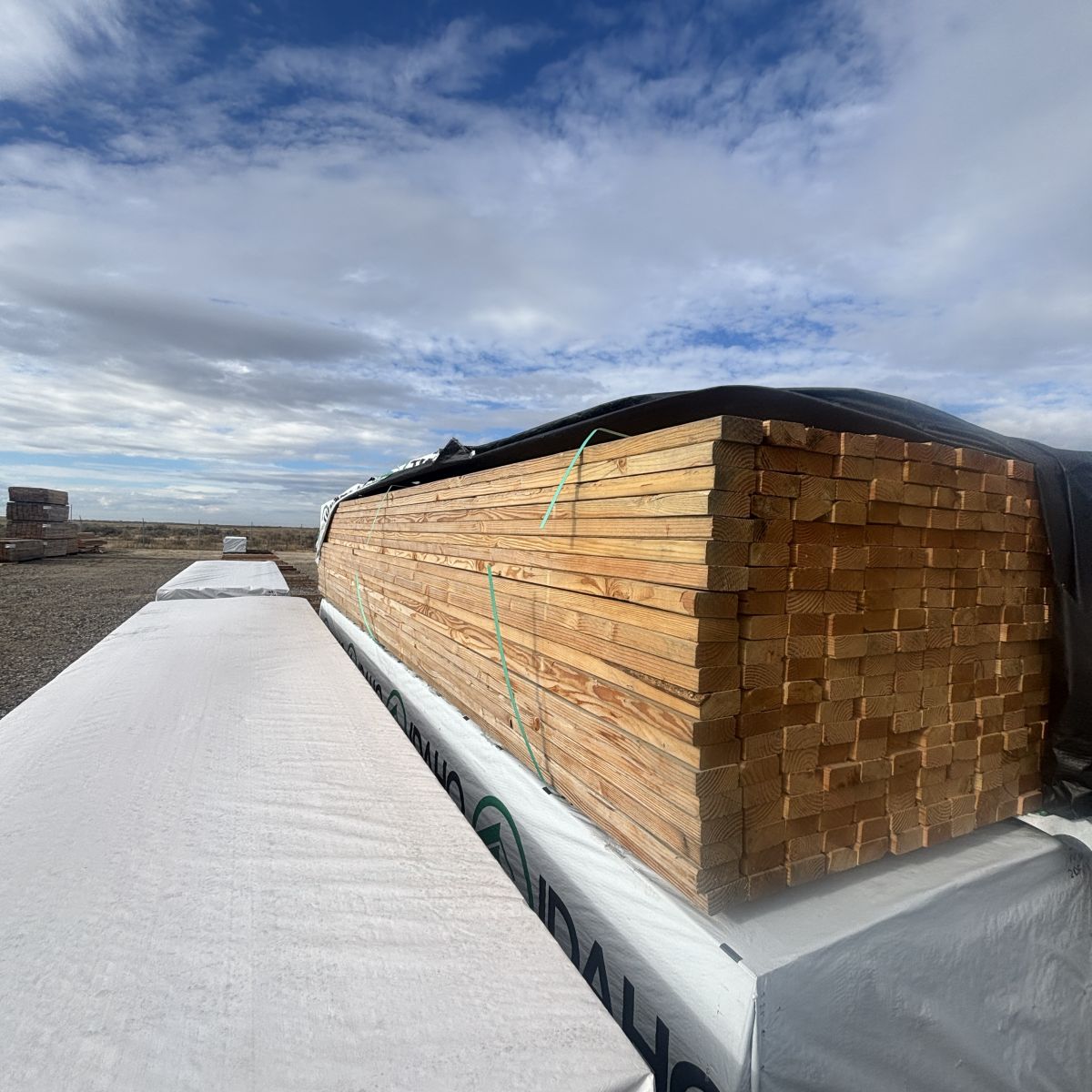 Unwrapped 2×4×16′ #2 kiln-dried Douglas Fir lumber unit staged at our Boise lumberyard