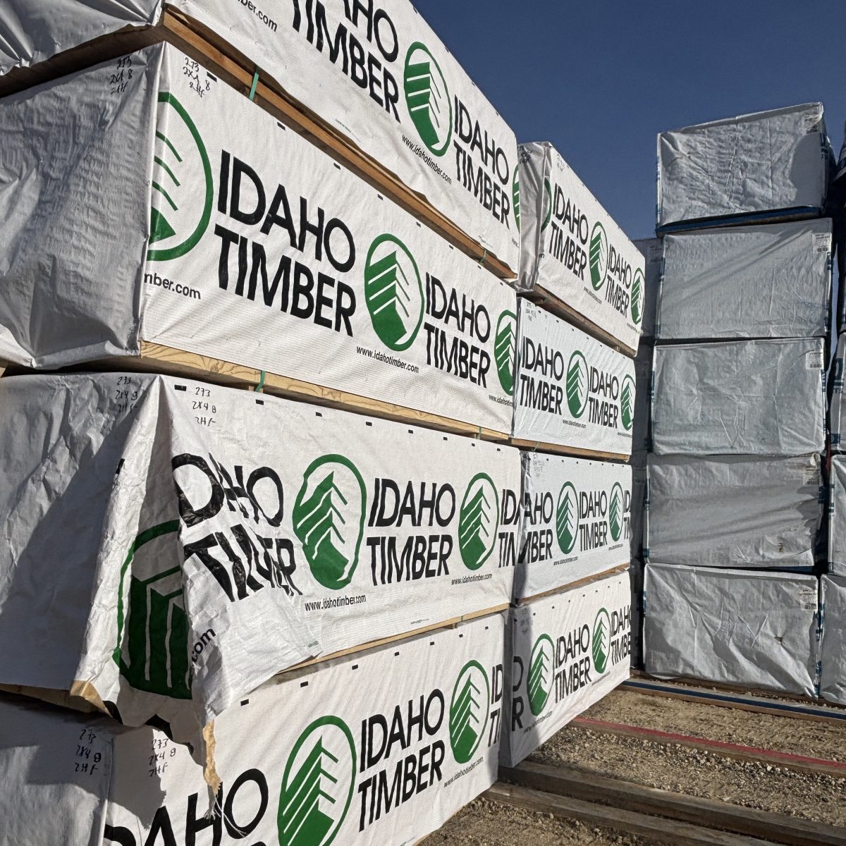 Angled wide yard view of 2×4×8′ #2 kiln-dried Hem-Fir lumber at our Boise lumberyard