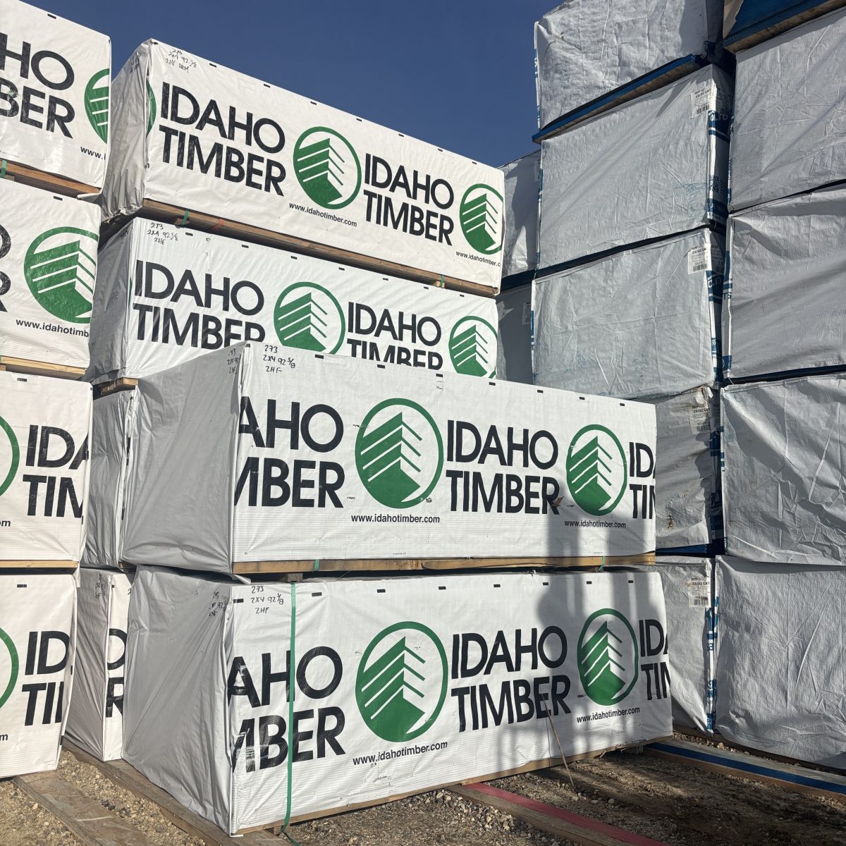 Angled yard view of 2×4 92-5/8″ #2 kiln-dried Hem-Fir precut studs at our Boise lumberyard