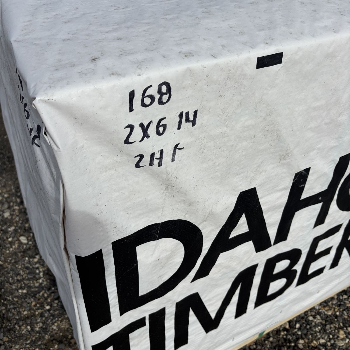 Close-up of 2×6-14′ #2 kiln-dried Hem-Fir lumber showing grain and bunk condition