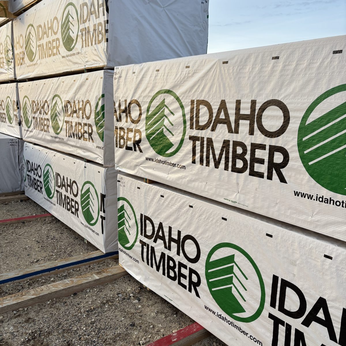 Angled yard view of 2×6-8′ #2 kiln-dried Hem-Fir lumber staged on platforms at our Boise lumberyard