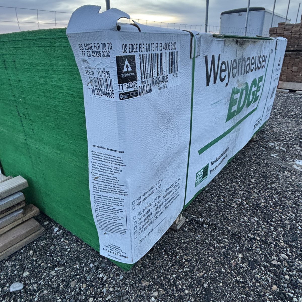 7/8 inch tongue and groove OSB subfloor sheathing 4x8 stacked at Boise lumberyard side view