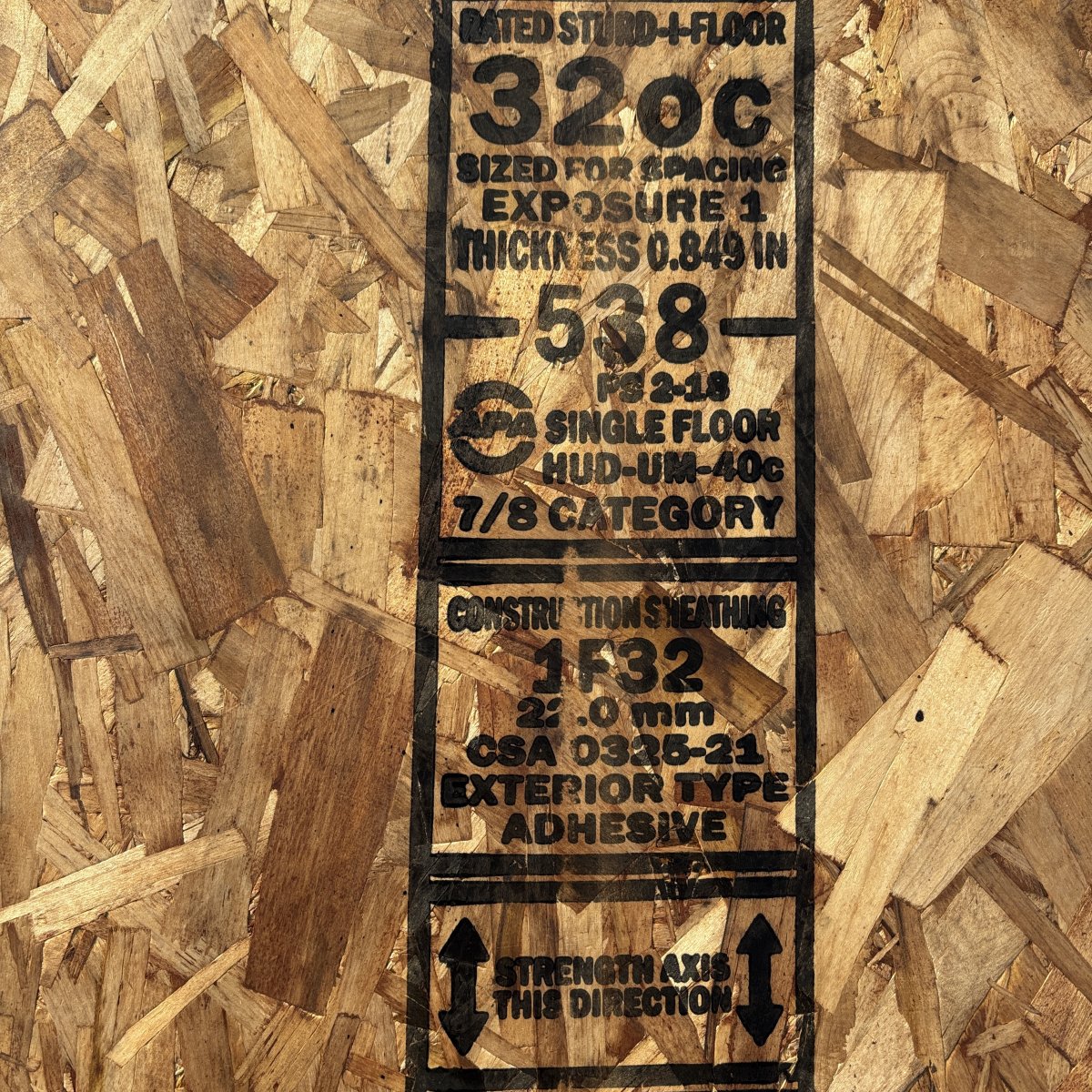 7/8 inch tongue and groove OSB subfloor sheathing 4x8 surface texture detail
